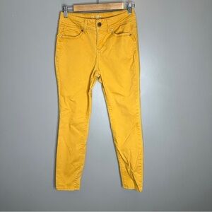 No boundaries golden yellow mid rise skinny jeans